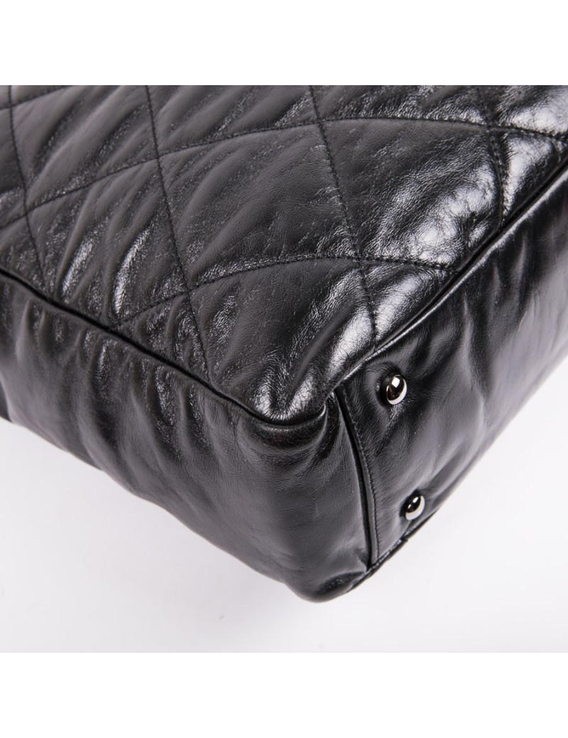 CHANEL Portobello bag in aged black quilted leather and dark gray tweed