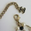 CHANEL multi row necklace with pearls, cc and Coco figurine