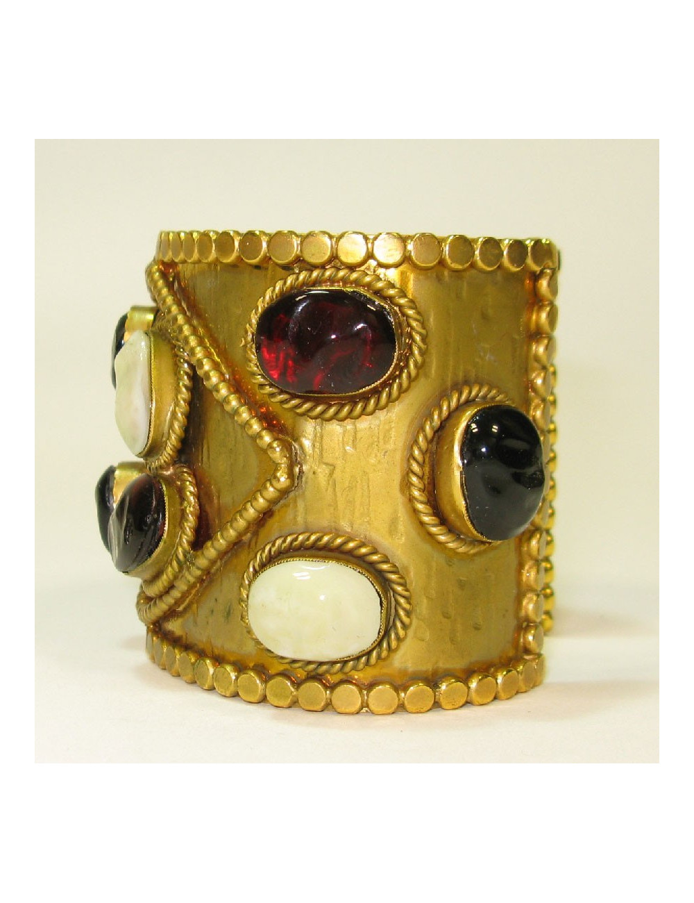 MARGUERITE de VALOIS Couture cuff bracelet in gilt metal and molten glass cabochons