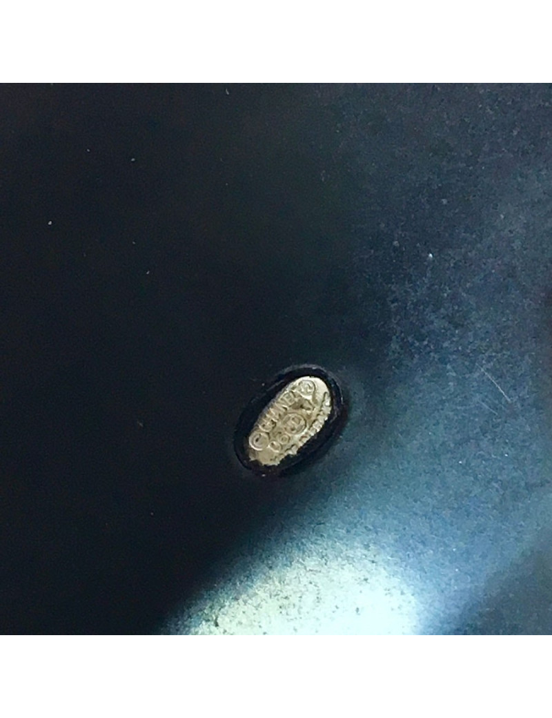 Manchette CC en plastique noir et blanc