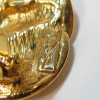Boucles d'oreilles clips YVES SAINT LAURENT vintage en métal doré