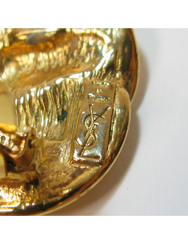 Boucles d'oreilles clips YVES SAINT LAURENT vintage en métal doré