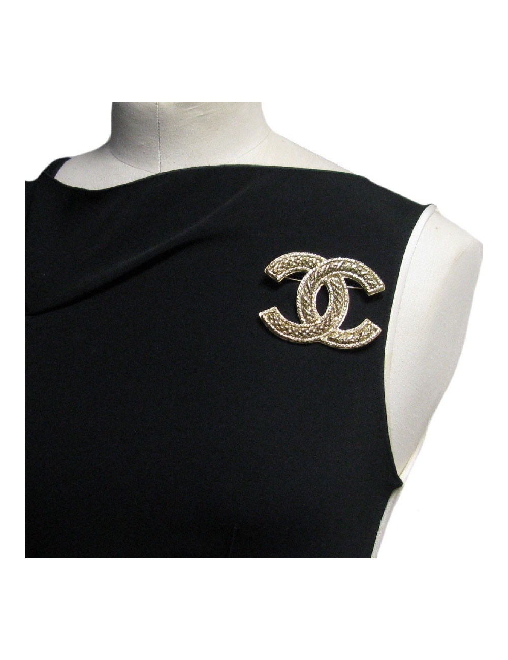 Broche CHANEL CC en métal doré