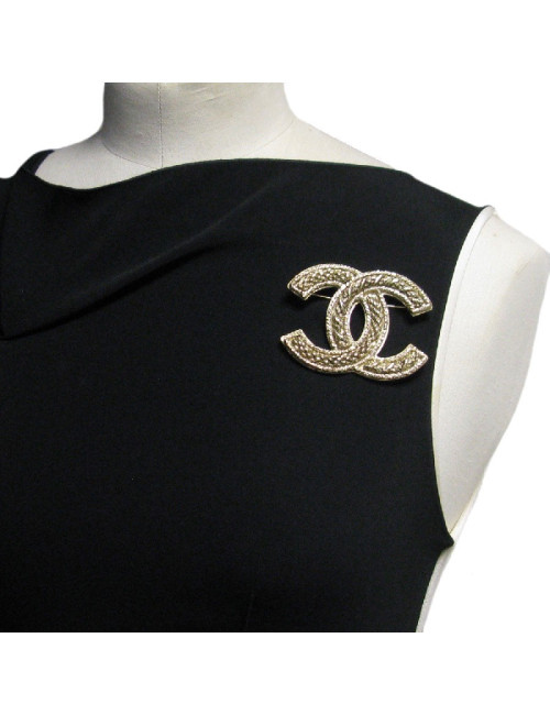 Broche CHANEL CC en métal doré