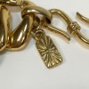 YVES SAINT LAURENT vintage knit necklace in gilt metal