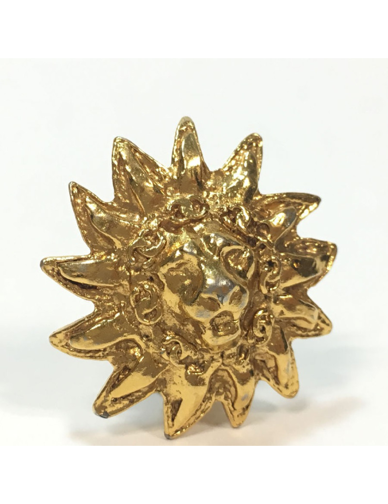 Boucles d'oreille CHANEL lion en métal doré 