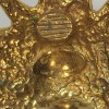 Boucles d'oreille CHANEL lion en métal doré 