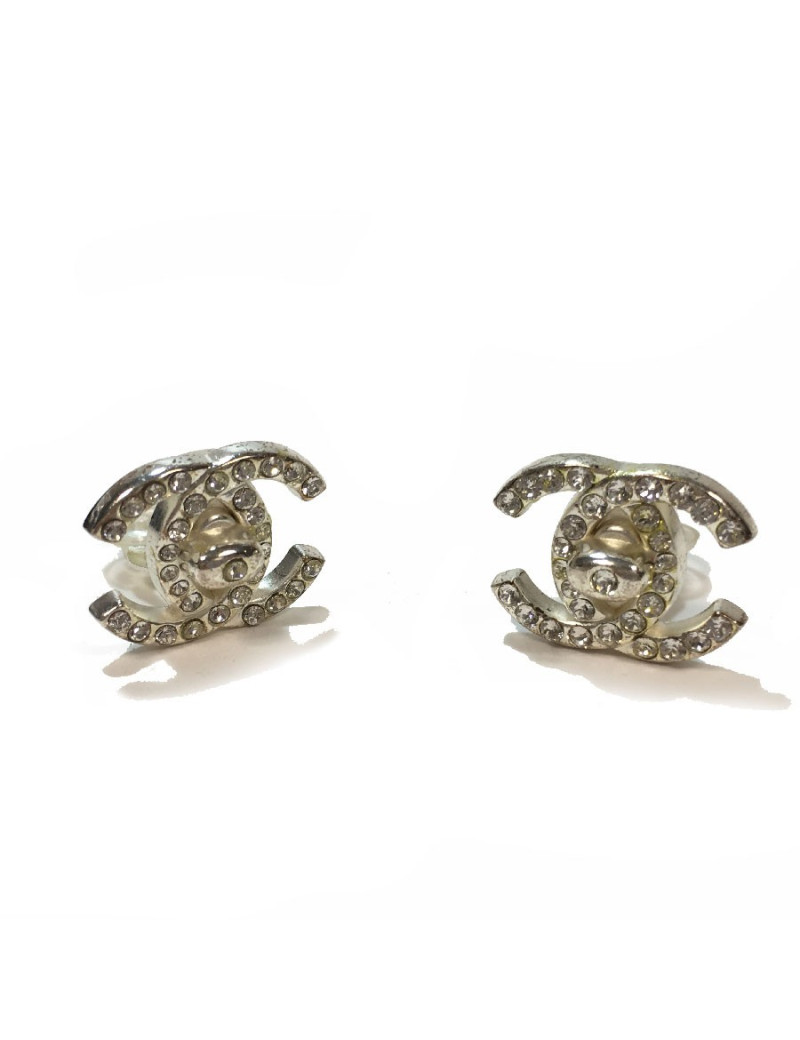 Boucles d'oreille Clips CHANEL CC strass et métal argenté
