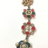 CHANEL long necklace in gold metal andmulticolored molten glass, rhinestones and pearls