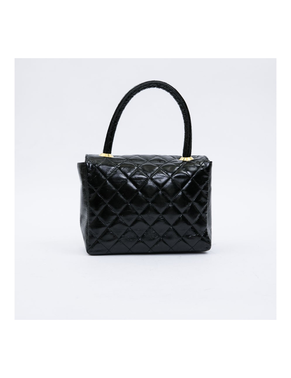 CHANEL mini bag in quilted semi-gloss black leather
