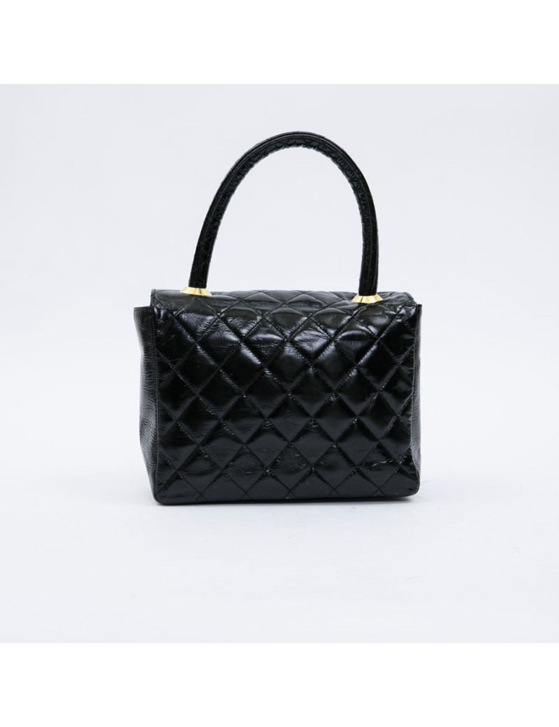 CHANEL mini bag in quilted semi-gloss black leather