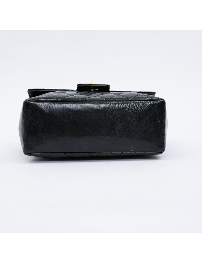 CHANEL mini bag in quilted semi-gloss black leather