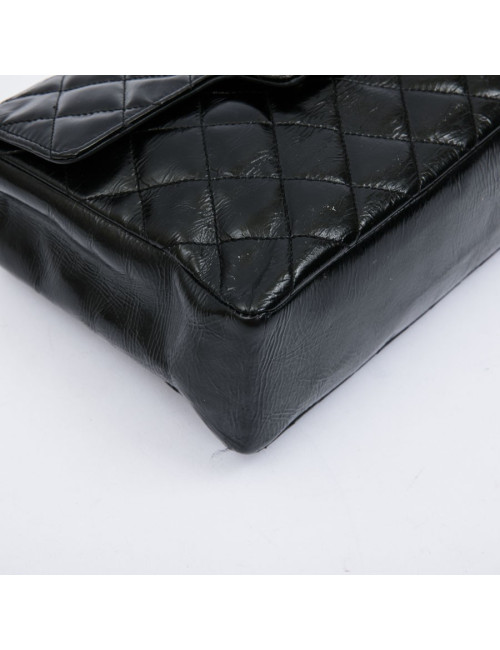 CHANEL mini bag in quilted semi-gloss black leather