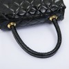 CHANEL mini bag in quilted semi-gloss black leather