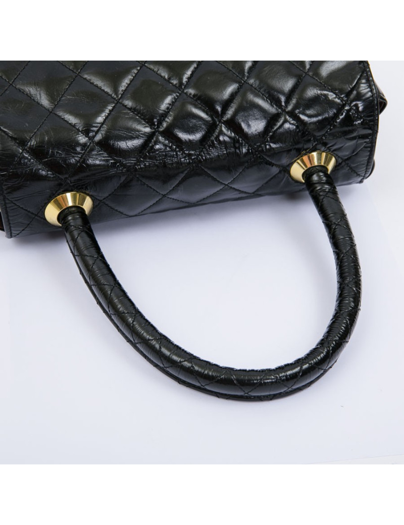 CHANEL mini bag in quilted semi-gloss black leather