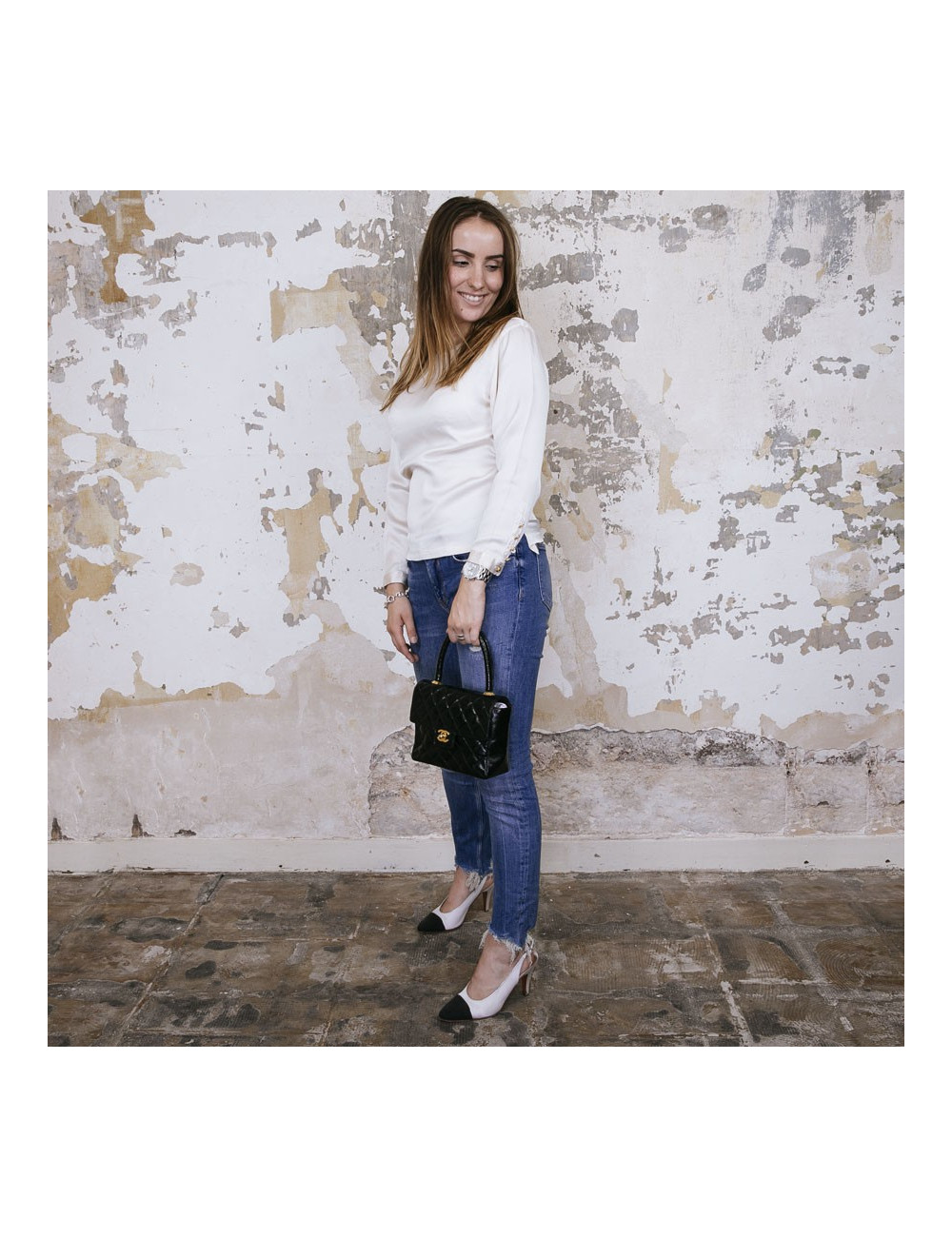 CHANEL mini bag in quilted semi-gloss black leather