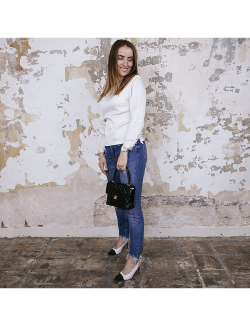 CHANEL mini bag in quilted semi-gloss black leather