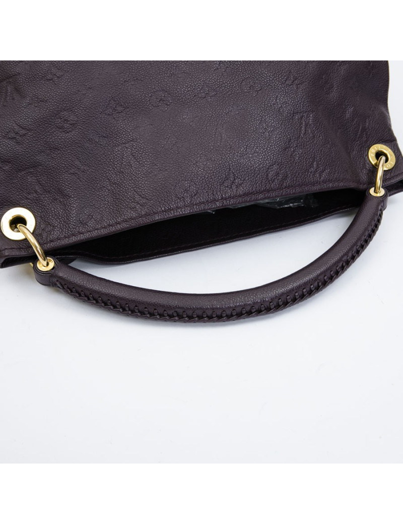 LOUIS VUITTON Artsy bag in grape empreinte embossed monogram leather