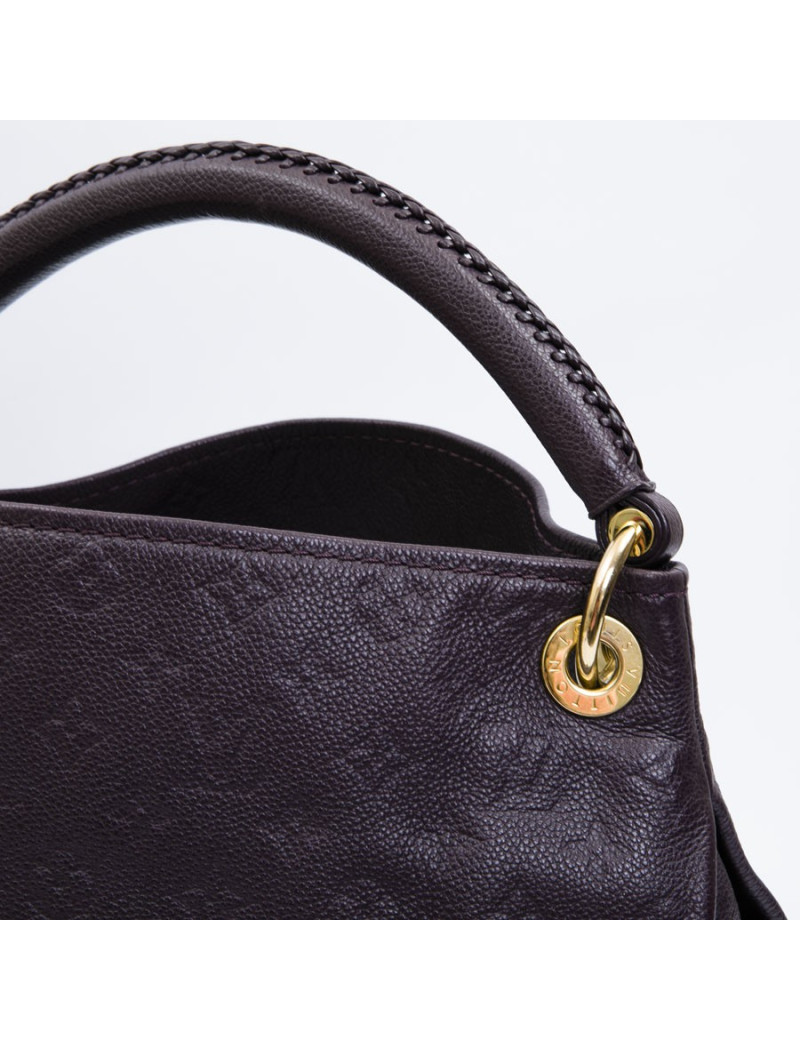 LOUIS VUITTON Artsy bag in grape empreinte embossed monogram leather