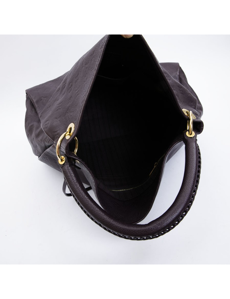 LOUIS VUITTON Artsy bag in grape empreinte embossed monogram leather
