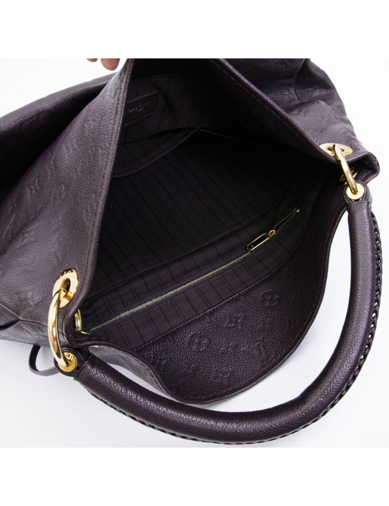 LOUIS VUITTON Artsy bag in grape empreinte embossed monogram leather