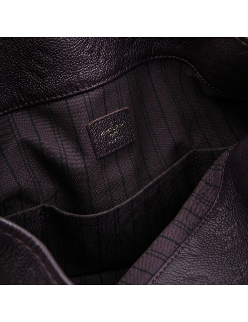 LOUIS VUITTON Artsy bag in grape empreinte embossed monogram leather