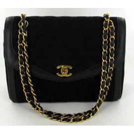 CHANEL Vintage black quilted jersey and Golden jewelry bag