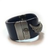 CHANEL cuff bracelet in blue resin and wings in silver metal