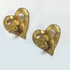 Boucles d'oreilles clips CHRISTIAN LACROIX coeur en métal doré or mat