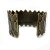 YVES SAINT LAURENT vintage cuff bracelet in bronze metal