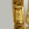 YVES SAINT LAURENT rigid bracelet in gilt metal