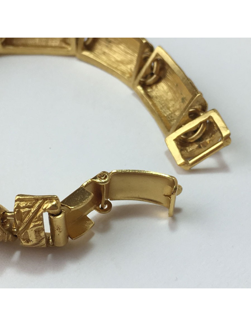 YVES SAINT LAURENT rigid bracelet in gilt metal
