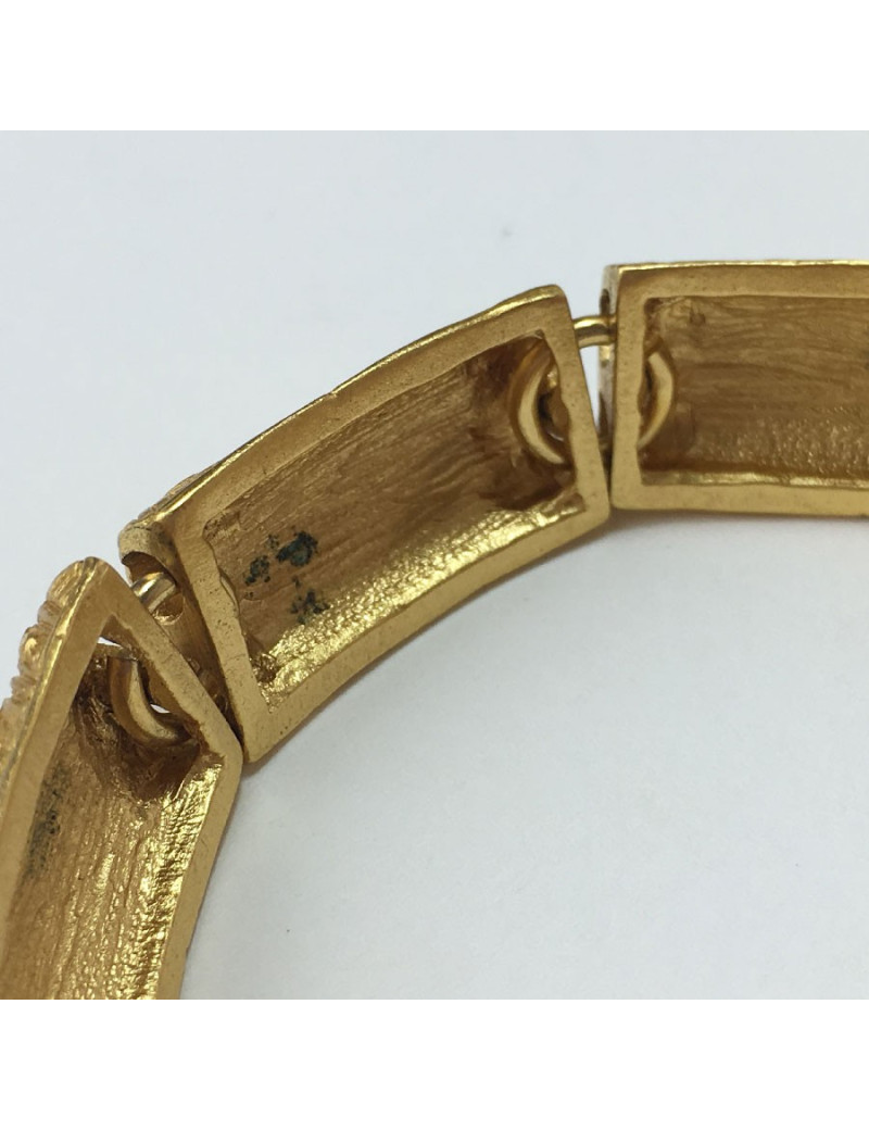 YVES SAINT LAURENT rigid bracelet in gilt metal
