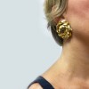  CHANEL vintage clip-on earrings in gilt metal and golden leather