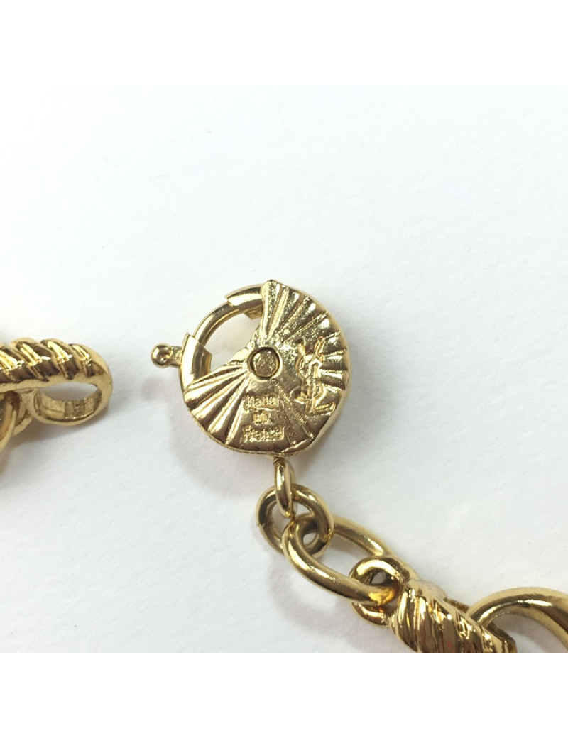 YVES SAINT LAURENT bracelet in gilt metal and rhinestones