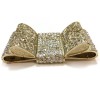 CHANEL knot brooch in rhinestones and pale gold metal
