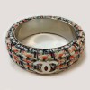 CHANEL rigid bracelet in multicolored tweed