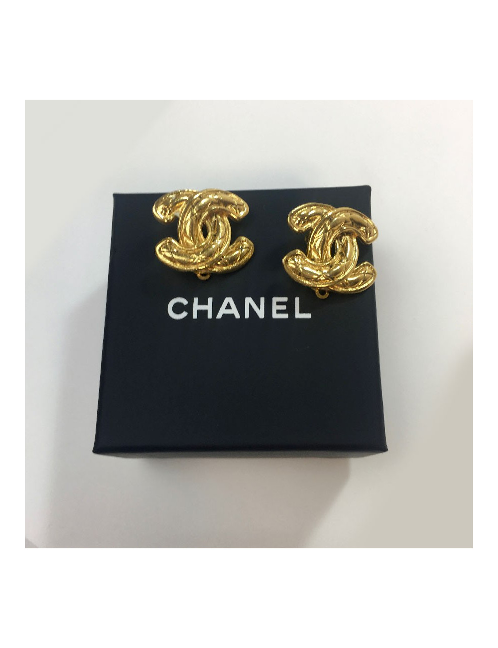 Boucles d'oreille clips CHANEL CC vintage dorés
