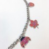 CHANEL chain belt in silver metal with charms