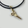 DIOR necklace with a scissors charm in gold and small diamond