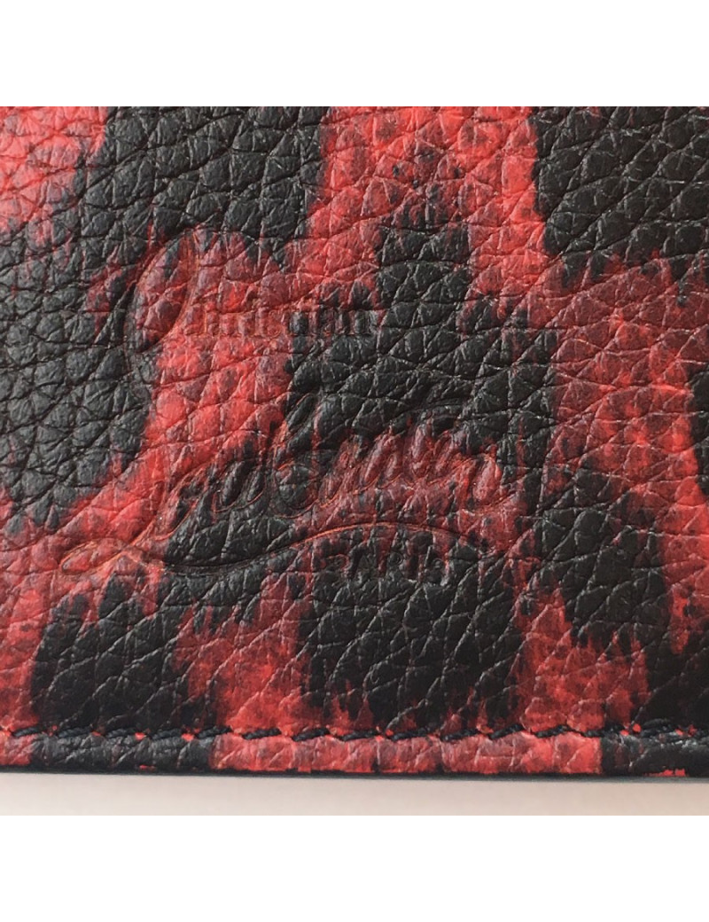 Portefeuille CHRISTIAN LOUBOUTIN en cuir rouge motif léopard