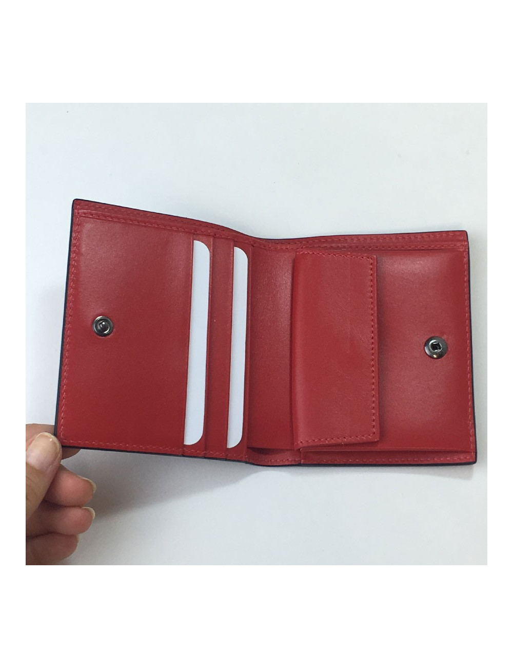 Portefeuille CHRISTIAN LOUBOUTIN en cuir rouge motif léopard