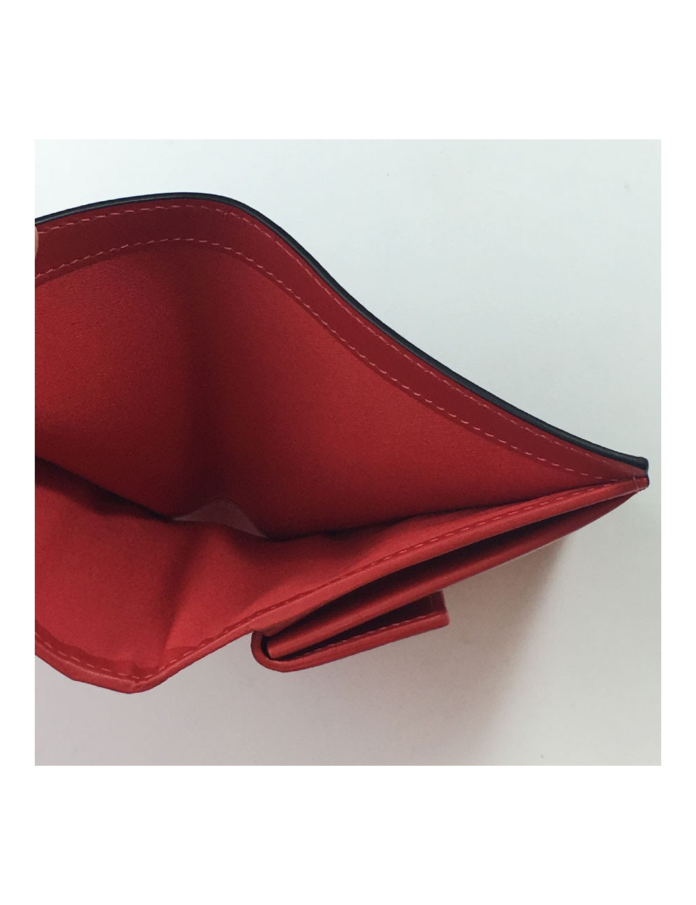 Portefeuille CHRISTIAN LOUBOUTIN en cuir rouge motif léopard