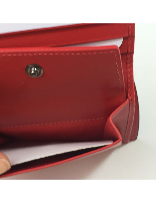 Portefeuille CHRISTIAN LOUBOUTIN en cuir rouge motif léopard