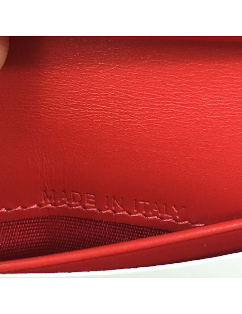 Portefeuille CHRISTIAN LOUBOUTIN en cuir rouge motif léopard