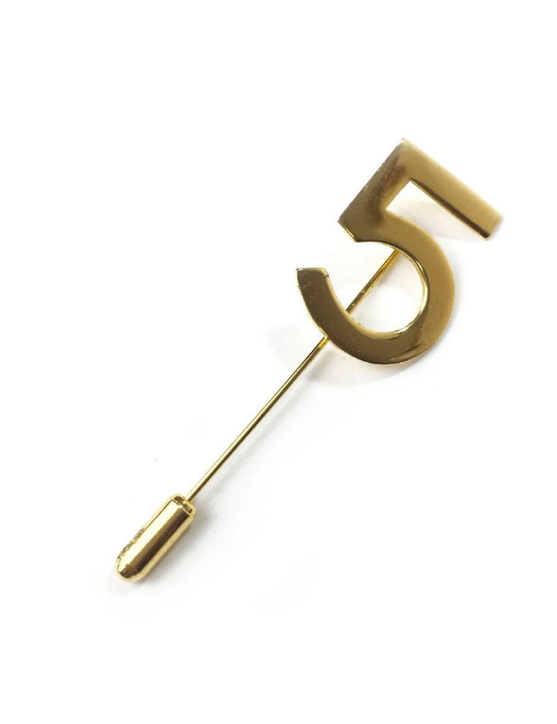 Epingle CHANEL "5" en métal doré