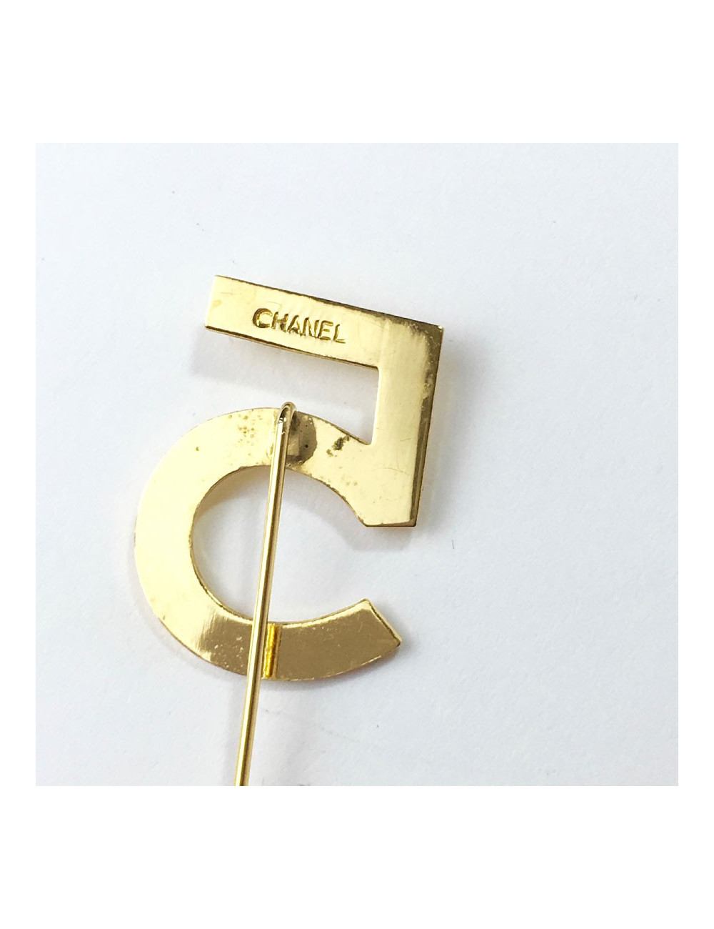 CHANEL number 5 pin in gilt metal