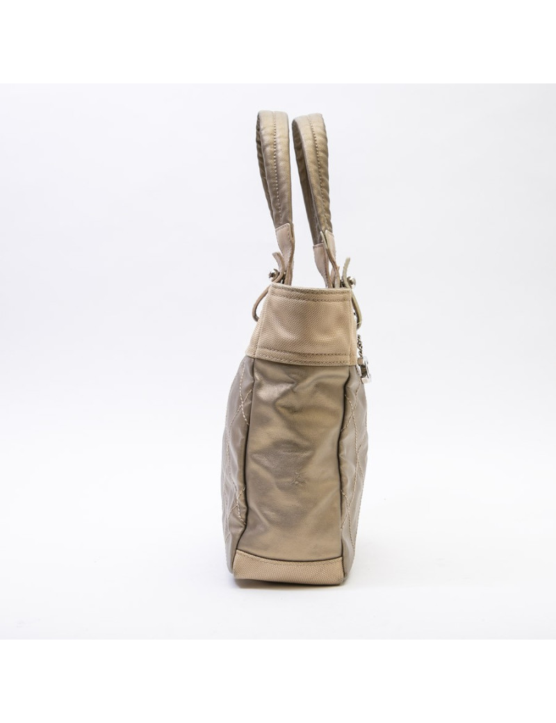 CHANEL Biarritz bag in gold beige quilted canvas