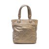 CHANEL Biarritz bag in gold beige quilted canvas