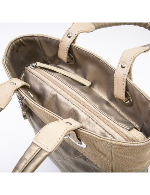 CHANEL Biarritz bag in gold beige quilted canvas